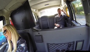Female cabbie copulates and sucks customer