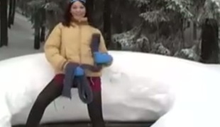 It's so cold outside as this brave hoe masturbates whilst laying on the snow